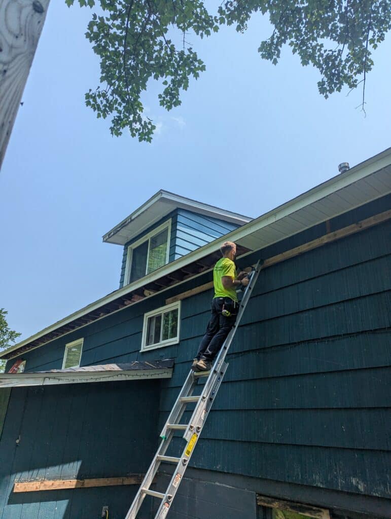 A.O. Kay Builders Work on Replacing fascia and soffit.